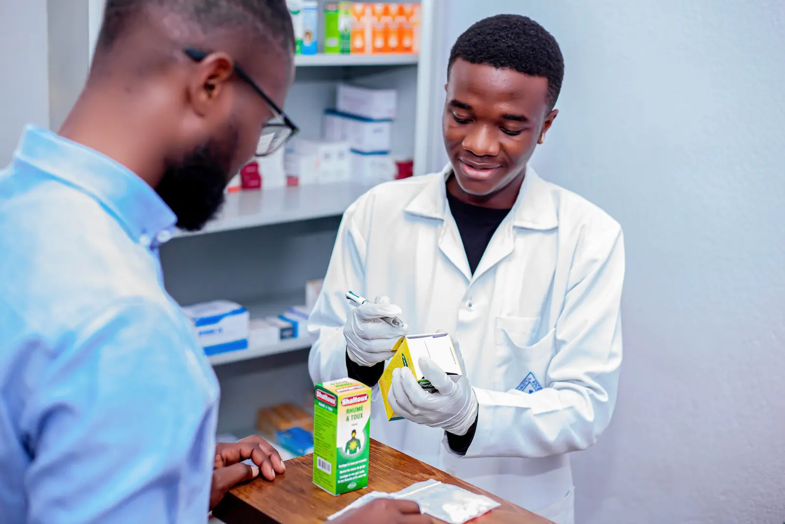 Pharmacy team dispensing medication